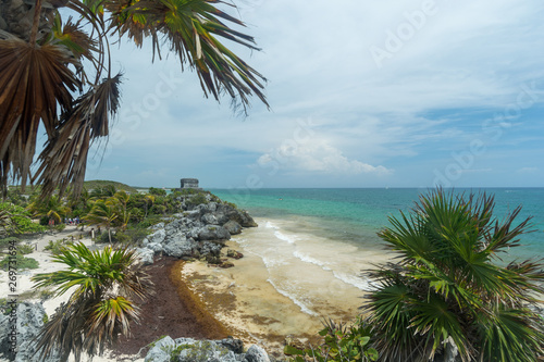 A view of the beach and ocean below the Temple of the Wind God Mayan ruins in Tulum  Quintana Roo  Mexico