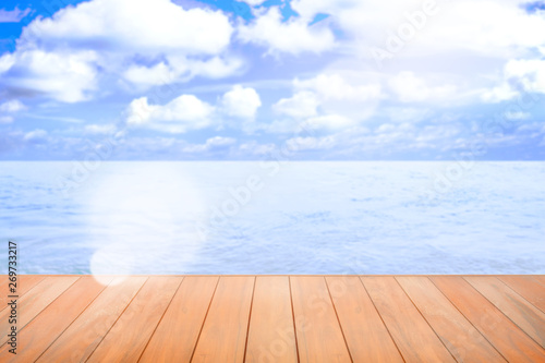 display wooden floor with blue sky and sea