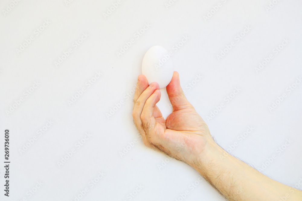 Healthy Eating -White dietary egg in hand on white background. Healthy Eating -White dietary egg in hand on white background.