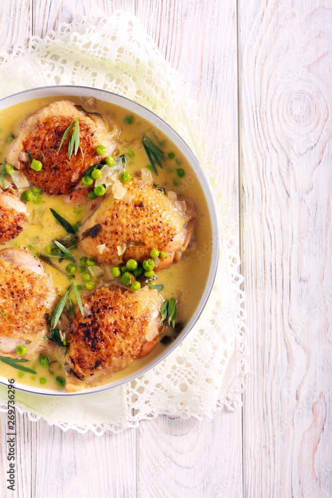 Chicken thighs with peas