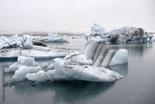 Icebergs in Jokulsarlon beautiful glacial lagoon in Iceland. Jokulsarlon is a famous travel destination in Vatnajokull National Park   Iceland 