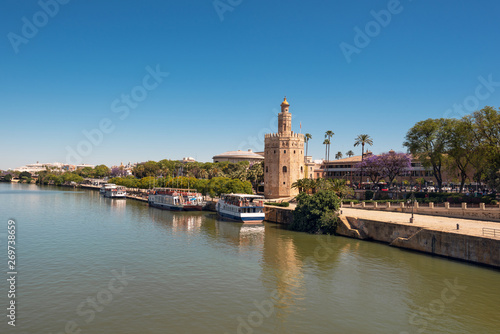 Golden tower Torre del Oro along the Guadalquivir river, Seville Andalusia , Spain . © herraez