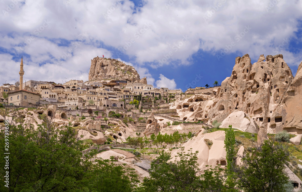 View of Uchisar and Uchisar fortress from Pigeon Valley. Cappadocia,  Turkey.