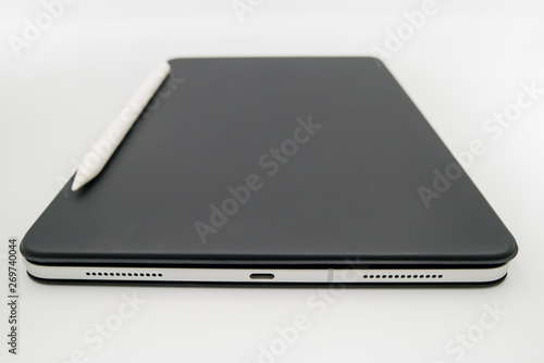 smart and moden tablet with smart pen and black cover color that isolated on white background