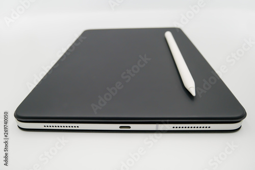 smart and moden tablet with smart pen and black cover color that isolated on white background