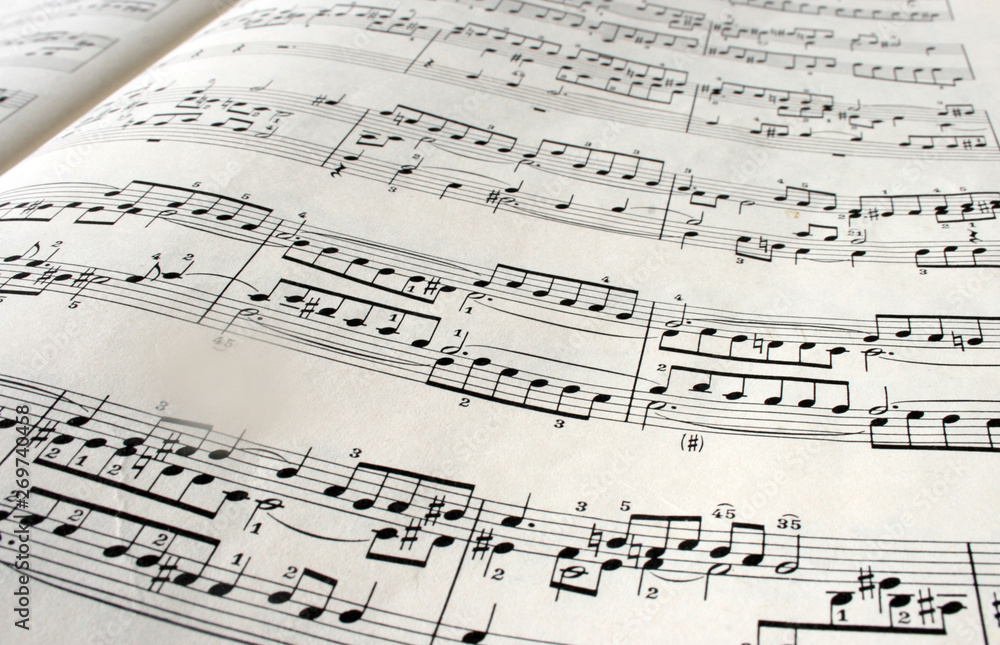 Printed music sheet, musical notes background, classic melody Printed music sheet, musical notes background, classic melody