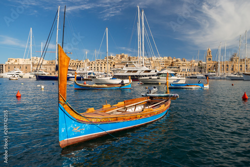 Traditional Maltese boat luzzu at Vittoriosa Yacht Marina. Senglea, Malta