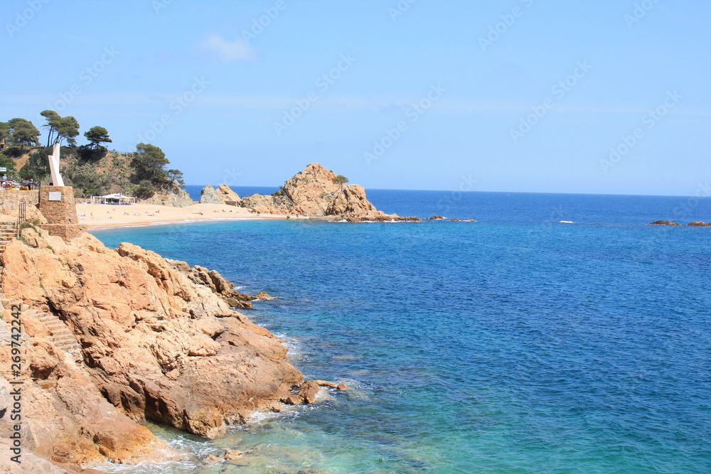 The amazing Mar Menuda sandy beach in Tossa de Mar, Costa Brava, Catalonia, Spain The amazing Mar Menuda sandy beach in Tossa de Mar, Costa Brava, Catalonia, Spain