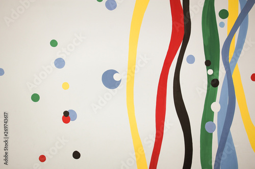 An image of colored wavy vertical lines on a gray background.