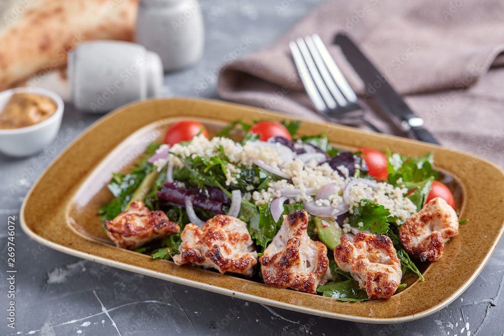 Chicken Salad. Chicken Caesar Salad. Caesar Salad with grilled chicken on plate. Grilled chicken breasts and fresh salad in plate Chicken Salad. Chicken Caesar Salad. Caesar Salad with grilled chicken on plate. Grilled chicken breasts and fresh salad in plate
