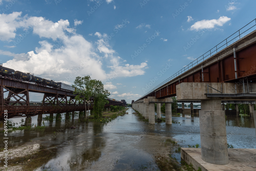 Two bridges over the Mississippi river in Memphis in springtime, greatly elevated water level