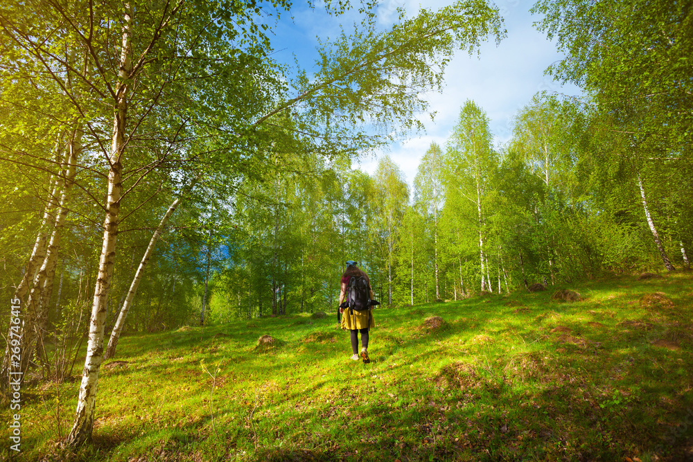 Girl travelling through beautiful epic mountain landscape Girl travelling through beautiful epic mountain landscape