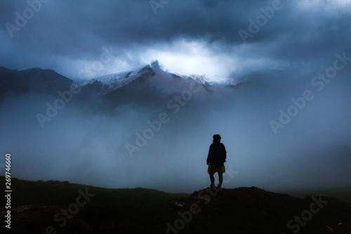 Girl travelling through beautiful epic mountain landscape © bdavid32