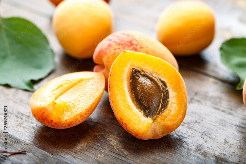 Ripe apricots and apricot leaves Ripe apricots and apricot leaves