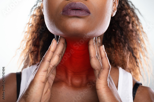 Woman Suffering From Sore Throat photo