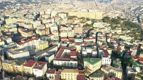 Aerial view of the hill and residential district of Vomero in Naples, Italy. Many are the buildings built in the narrow streets of the city. In the Backgroung Nisida Island and Fuorigrotta district. photo