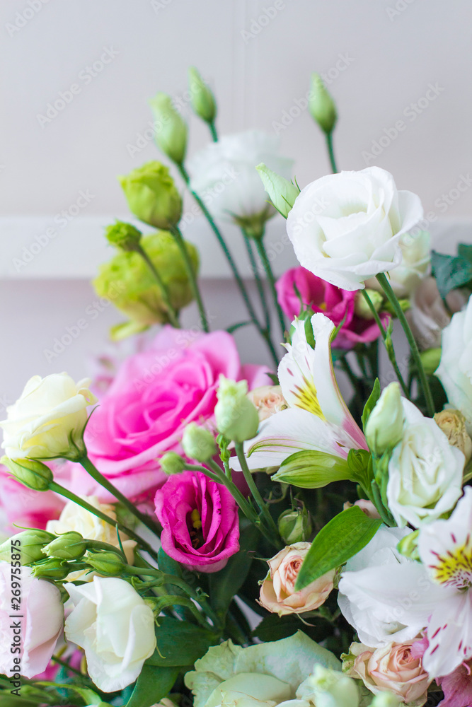 Bouquet of flowers. Flower Arrangement: Roses, Eustomas, Alstroemeria