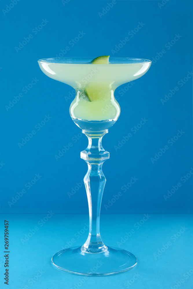 Hemingway daiquiri cocktail on blue background Hemingway daiquiri cocktail on blue background