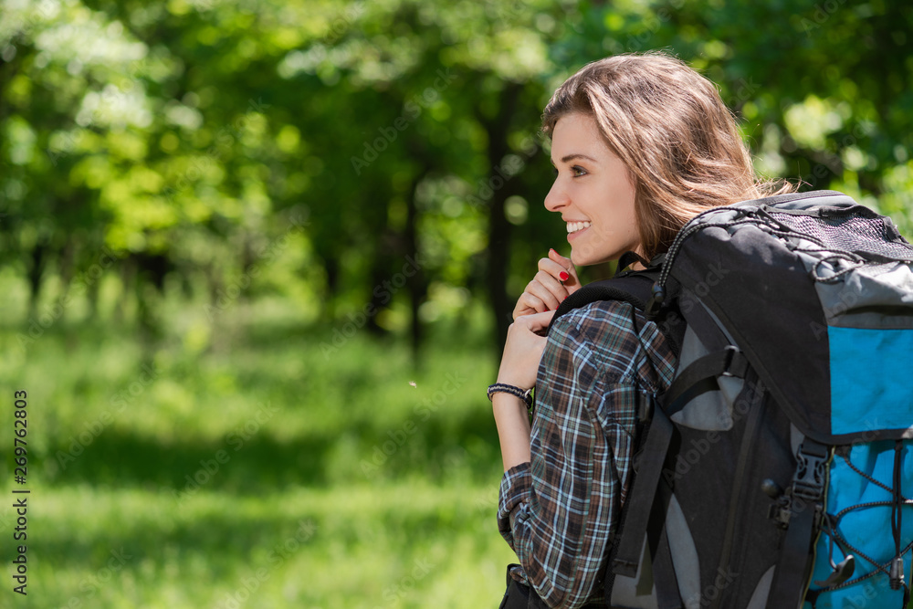 Back view of tourist girl with backpack Back view of tourist girl with backpack