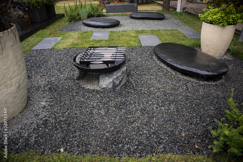 Photography the Japanese-style garden with large boulders with barbecue grill