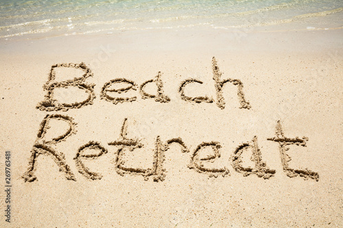 Beach Retreat Text On The Sandy Beach