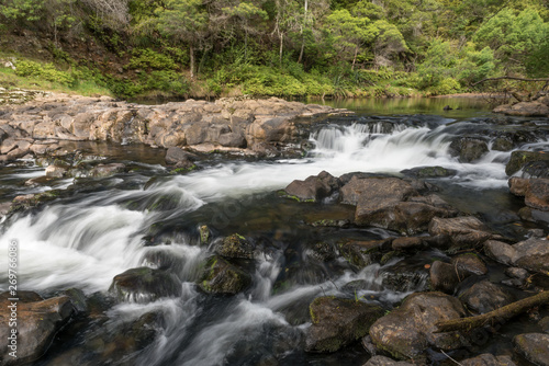 Rapids on the Kerikeri River as it emerges from the Fairy Pools. Kerikeri, Northland, New Zealand.