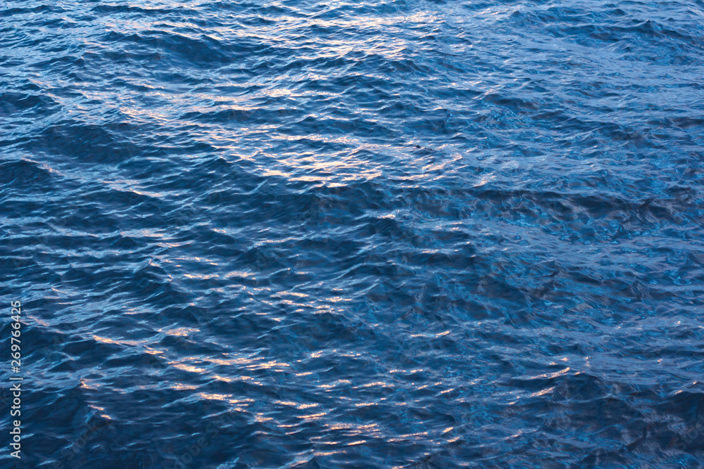 Blue little waves at sunset Blue little waves at sunset