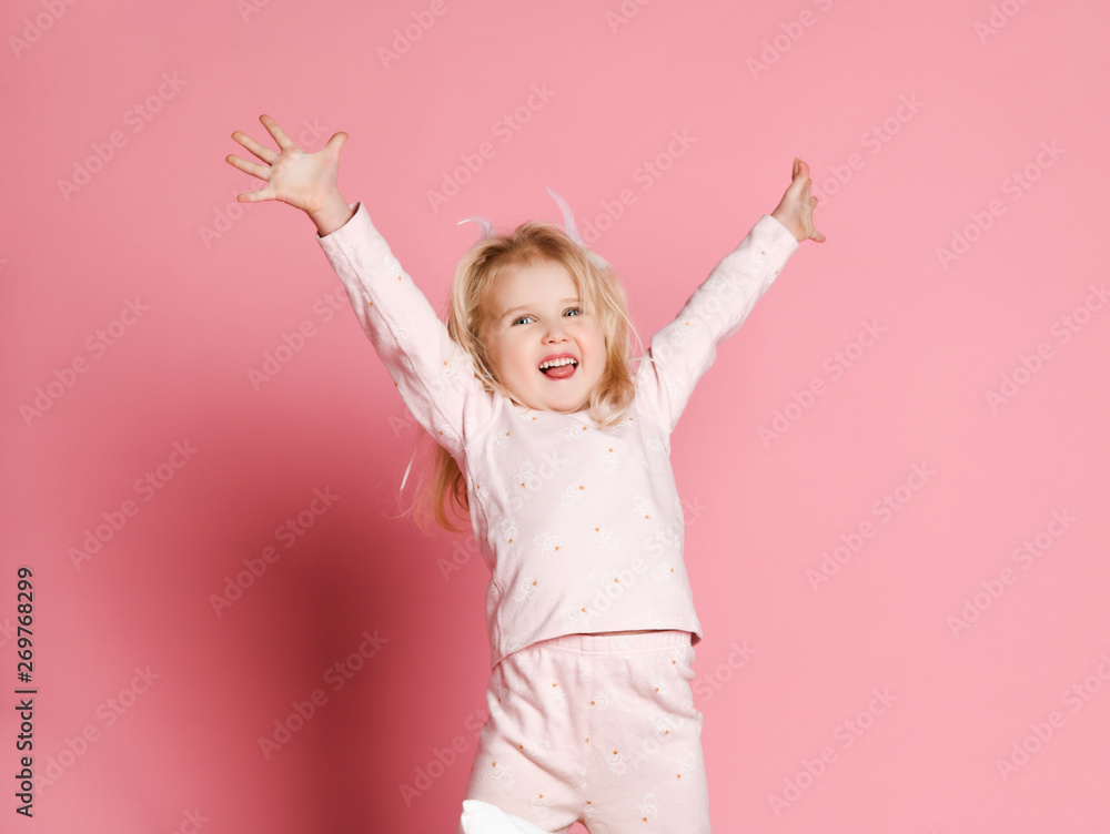 Happy kid pajama jumping - obrazy, fototapety, plakaty 
