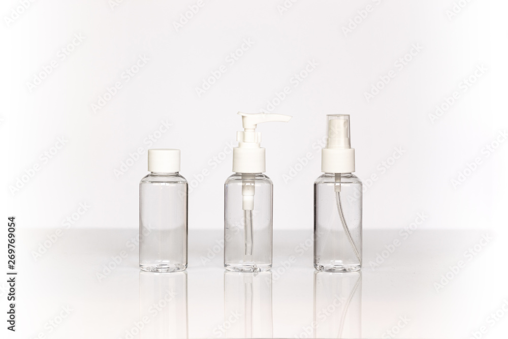 Beauty cosmetics glassbottle; branding mock up; front view on pastel white background. Package for essential oil. Beauty cosmetics glassbottle; branding mock up; front view on pastel white background. Package for essential oil.
