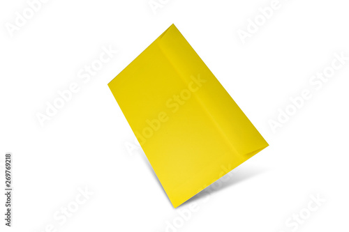 Yellow envelope on a white background with copy space. Flat lay mockup for valentines day, womans day, wedding or birthday