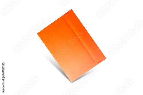 Orange envelope on a white background with copy space. Flat lay mockup for valentines day, womans day, wedding or birthday