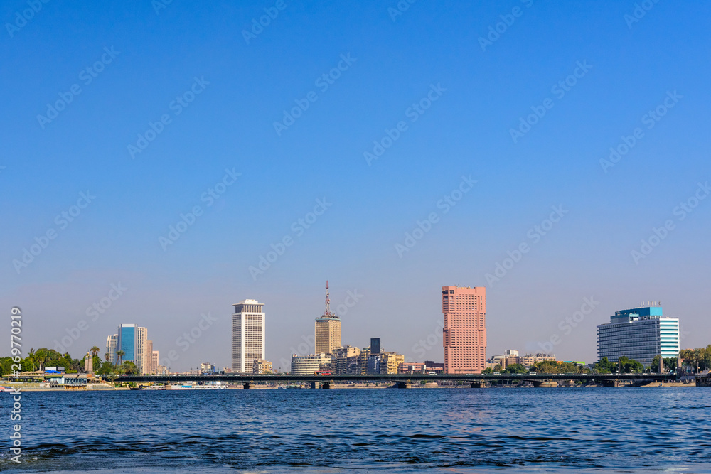 Residential and office buildings of the Cairo city. View from Nile river