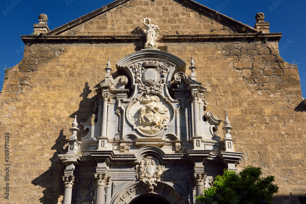 Fototapeta premium Church of Saint Justus and Pastor with statue of Saint Ignatius in the University Plaza Granada