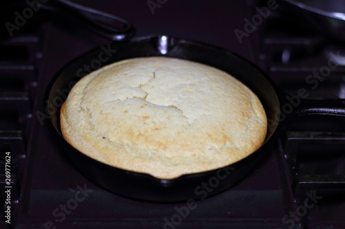 Wallpaper Mural Cornbread in a cast iron skillet resting on the stove top. Torontodigital.ca