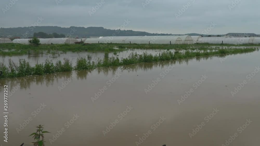 Flooded landscape in the water meadows of the lower a cloudy sky Flooded landscape in the water meadows of the lower a cloudy sky