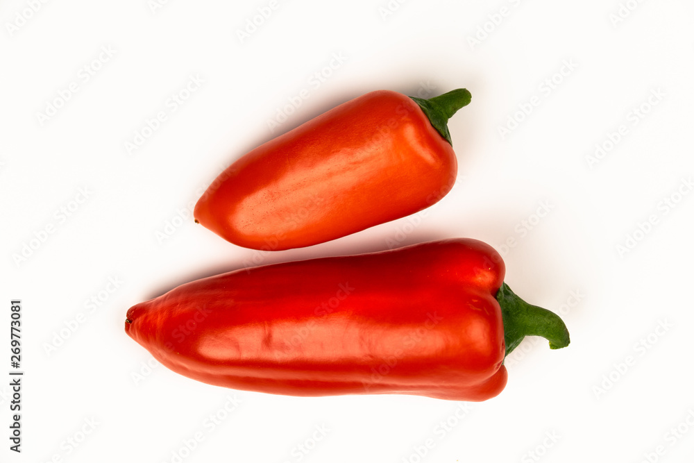 fresh spicy red peppers on a light background fresh spicy red peppers on a light background