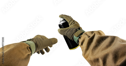 Isolated graffiti tagger hands in gloves holding paint spray can first person view.