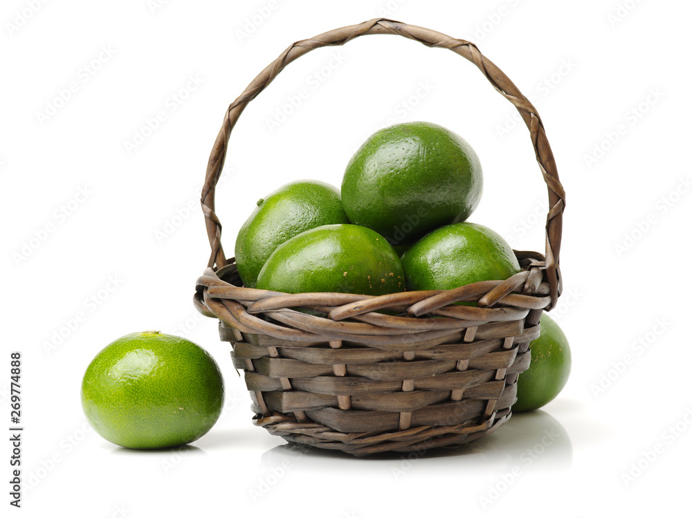 Fresh limes on white background