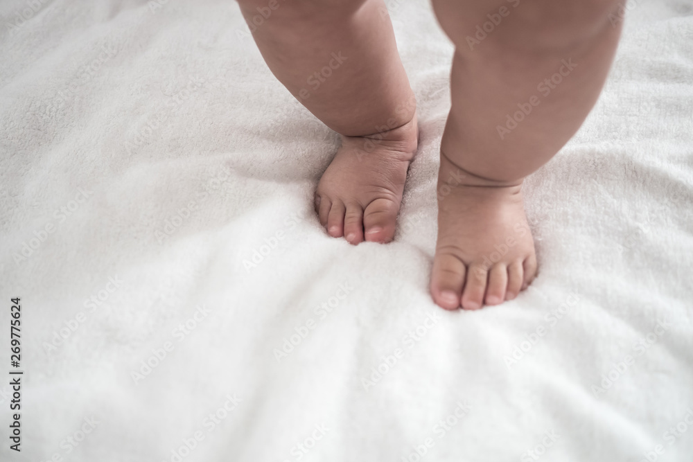 Baby Foot walk step on blanket with copy space Baby Foot walk step on blanket with copy space