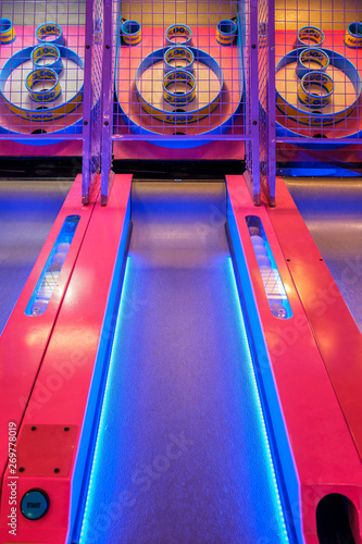 roll a ball up a ramp into a hole