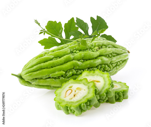 Bitter melon with leaf on white background. full depth of field