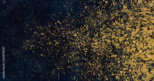 Abstract watercolor paint in deep blue and gold color flicks glitter texture for luxury background concept.