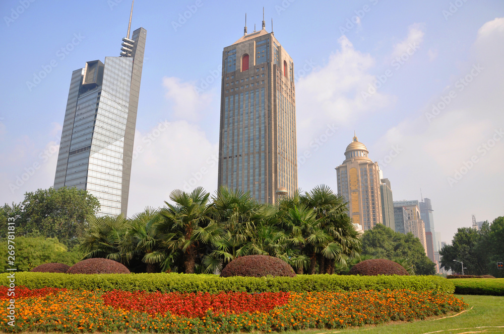 Fototapeta premium Jiangsu Broadcasting (JSBC) Building, Nanjing Postal Building and China Citic Bank in Gulou Square in the city center of Nanjing (Southern Capital), Jiangsu Province, China.