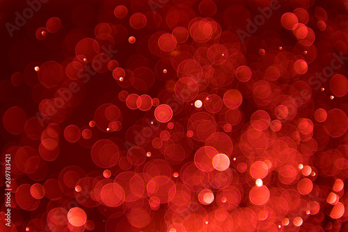 Glitter lights abstract dark red background. Defocused bokeh dark illustration