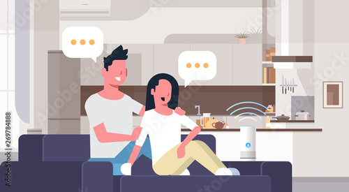 couple sitting on couch man woman using smartphone smart speaker voice recognition concept chat bubble communication modern living room interior flat horizontal