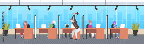 angry businessman hitting alarm clock by hummer tired business man trying to destroy classic watch on workplace desktop deadline concept modern co-working office interior full length horizontal