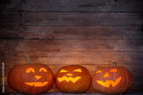 Halloween pumpkin on old wooden background