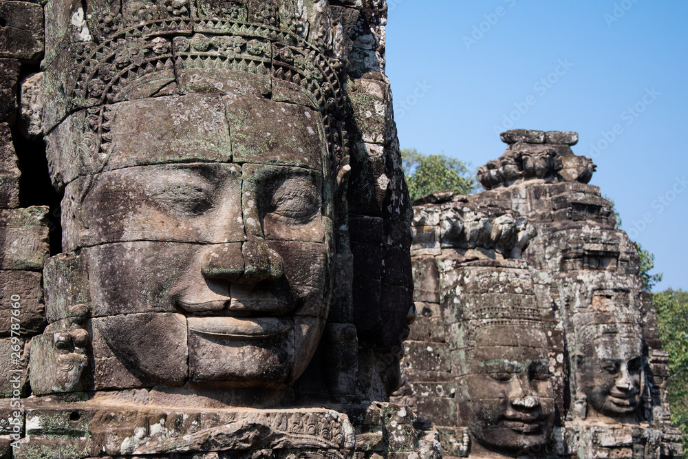 Fototapeta premium Triple Bayon faces in Bayon Temple, Siem Reap, Cambodai