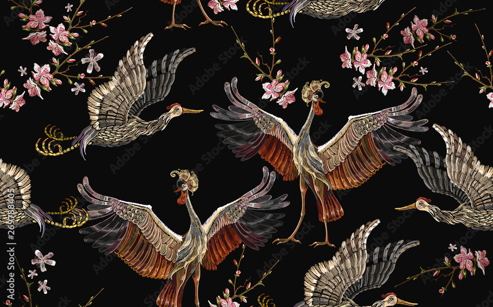 Fototapeta Embroidery crane birds and sakura flowers seamless pattern. Asian template for clothes, textiles, t-shirt design. Japanese art