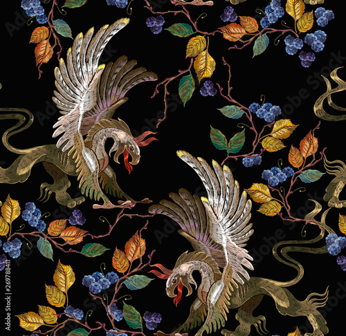 Embroidery griffins and black berries leaves seamless pattern. Medieval art. Template for clothes, t-shirt design.  Gothic template tapestry renaissance style